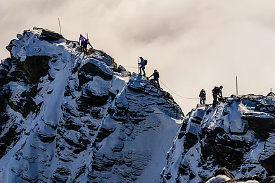 Ondrej Bucek/Shutterstock : Mountaineers climbing to the highest Austrian mountain, Grossglockner
